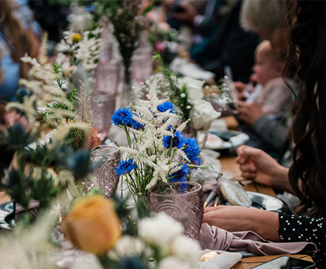 Flowers in Vases on table
